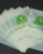 Set of compostable zipper bags with green print
