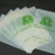 Set of compostable zipper bags with green print