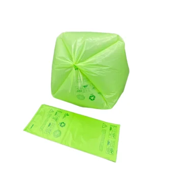 Compostable trash bag with green label and unfolded sheet